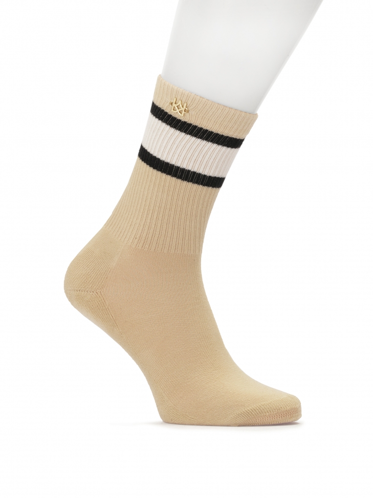 Beige cotton socks decorated with a gold monogram