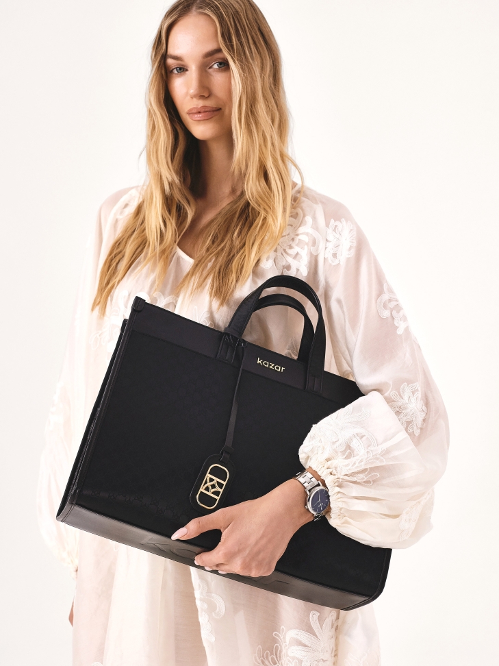 Large handbag made of fabric and natural leather