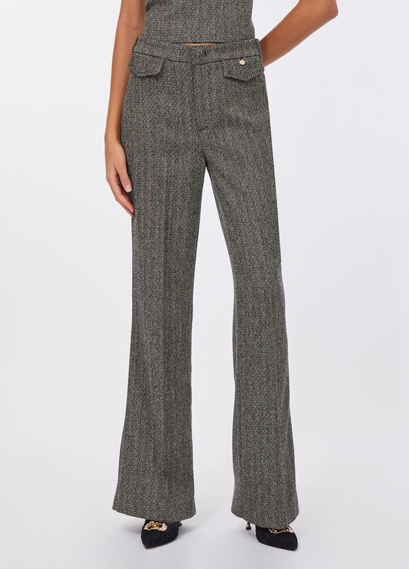 Pantaloni flare spinati