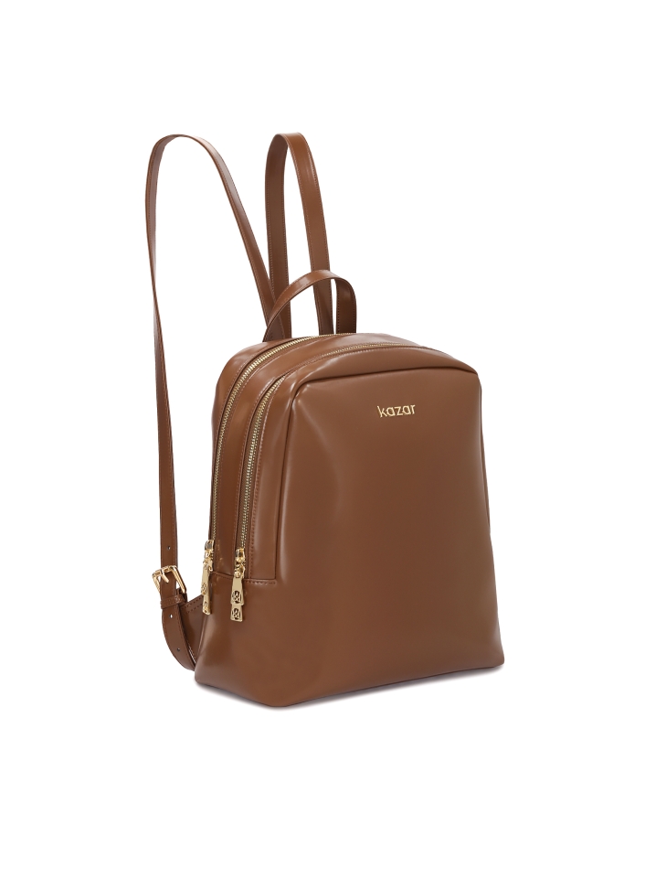 Minimalist brown backpack with gold hardware