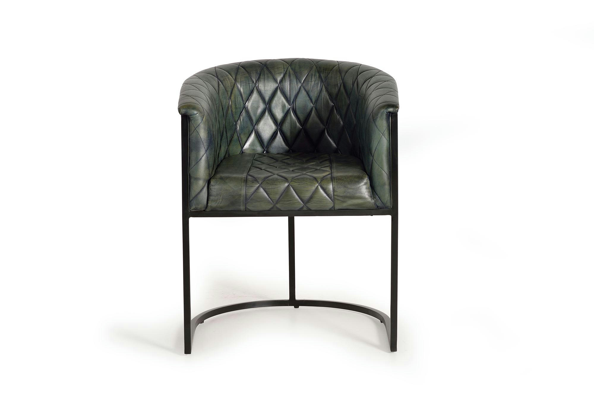 - Fauteuil en cuir vert materasée et métal