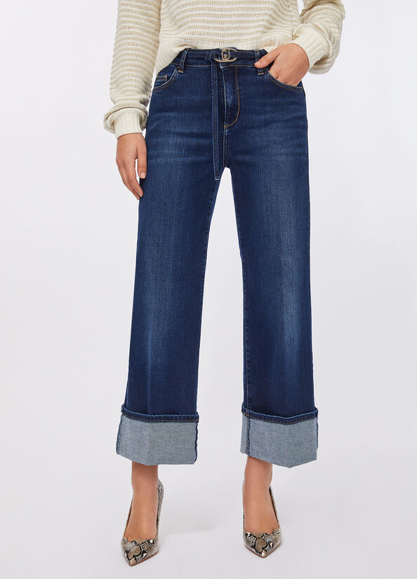Jeans flare cropped con cintura