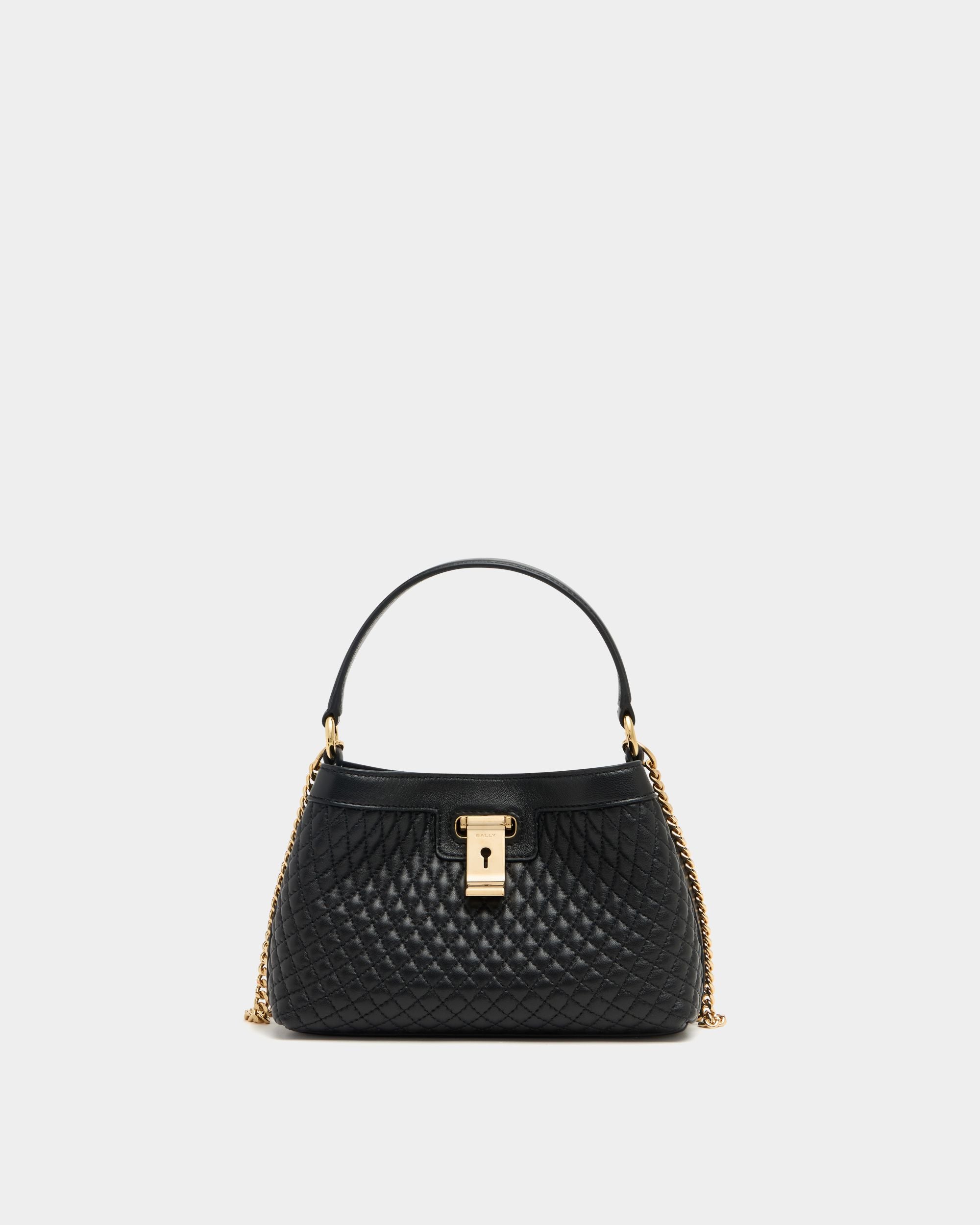 Lock Me Minitasche aus gestepptem Leder in Schwarz