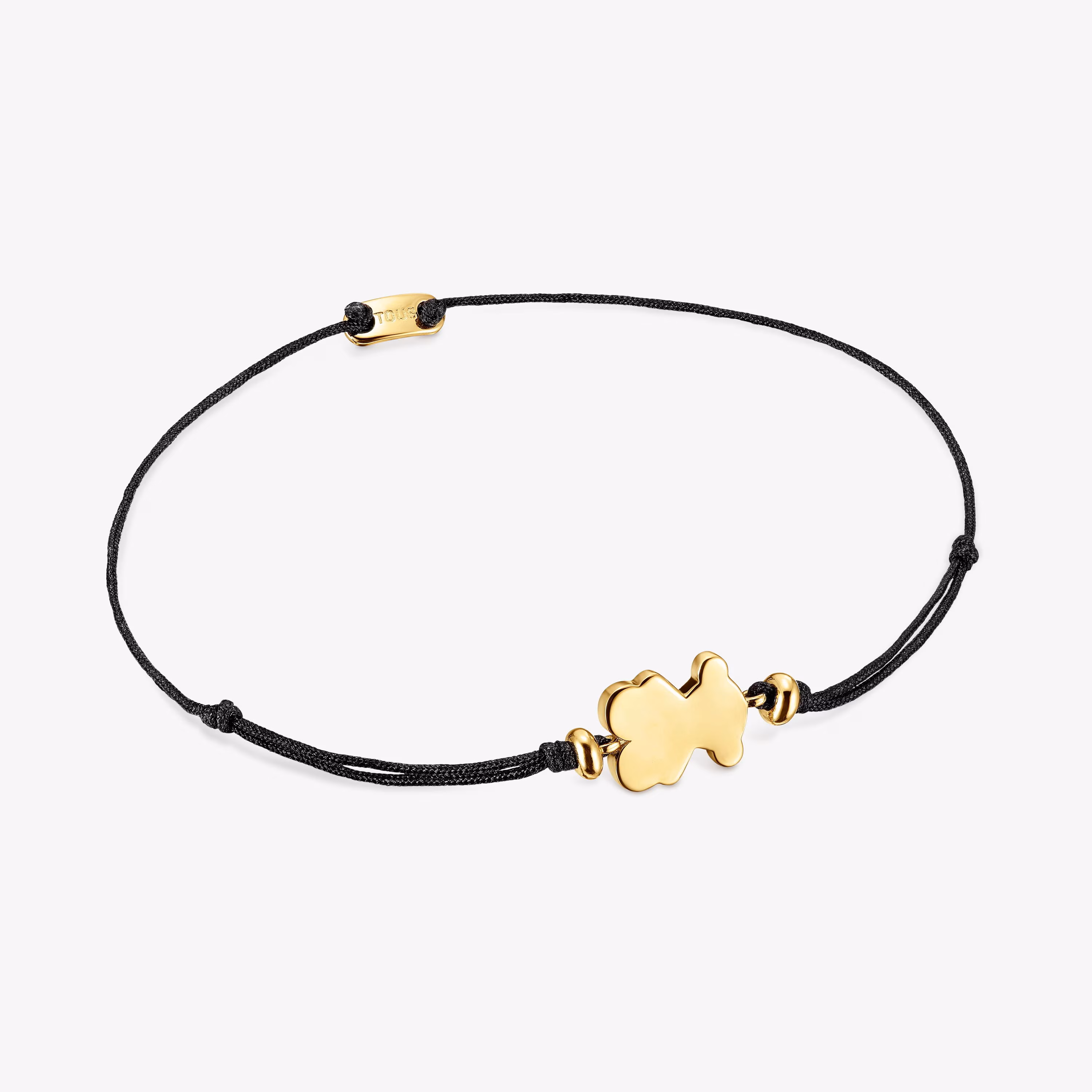 Pulsera con baño de oro 18 kt sobre plata y nylon negro con motivo oso Sweet Dolls