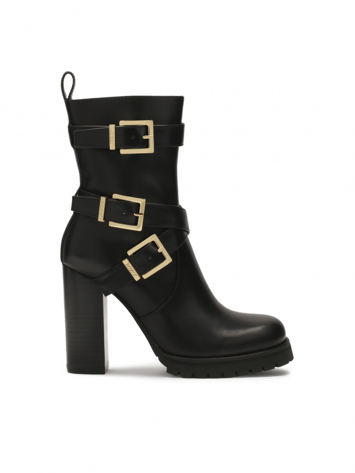 Black leather stiletto boots with high upper