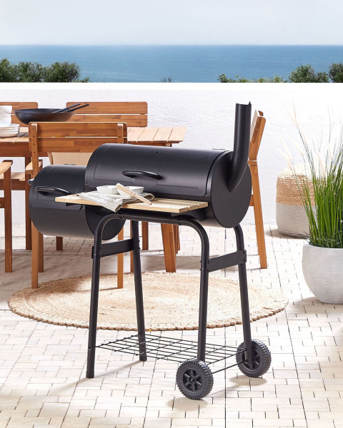 Ogrodowy grill węglowy z wędzarnią ma kółkach