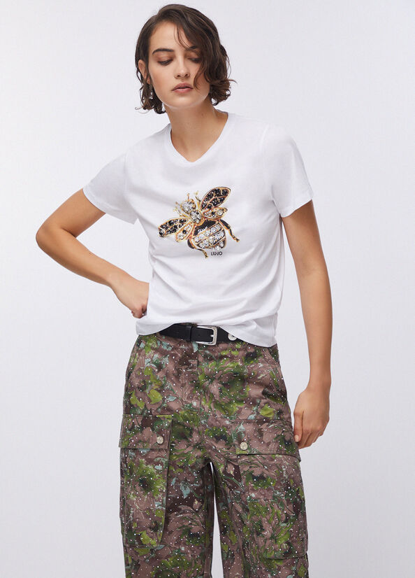 T-shirt con stampa e applicazioni