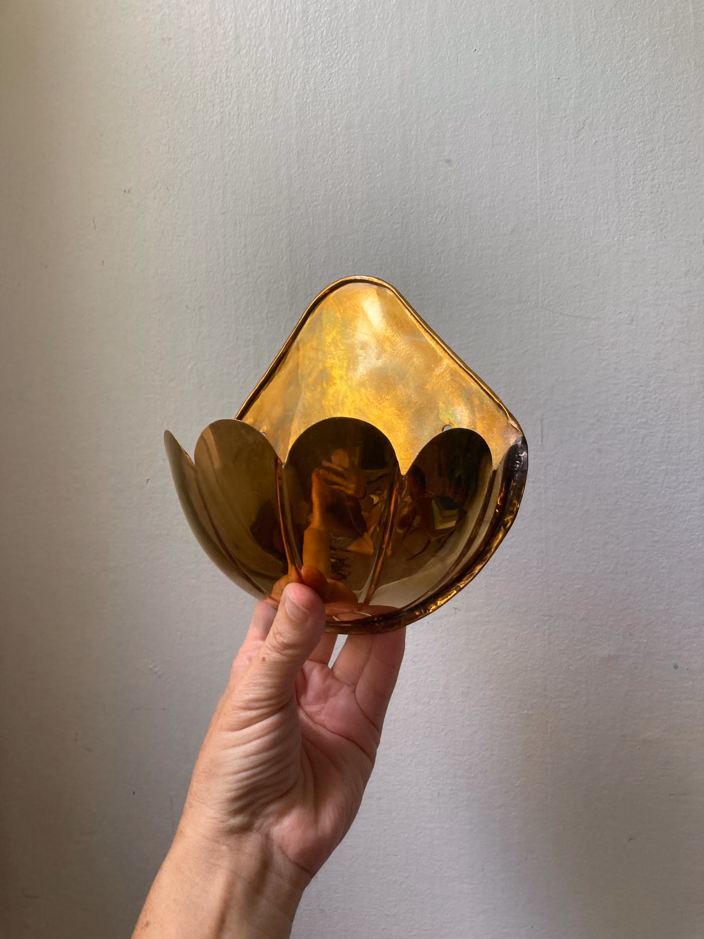 Scalloped brass wall planter