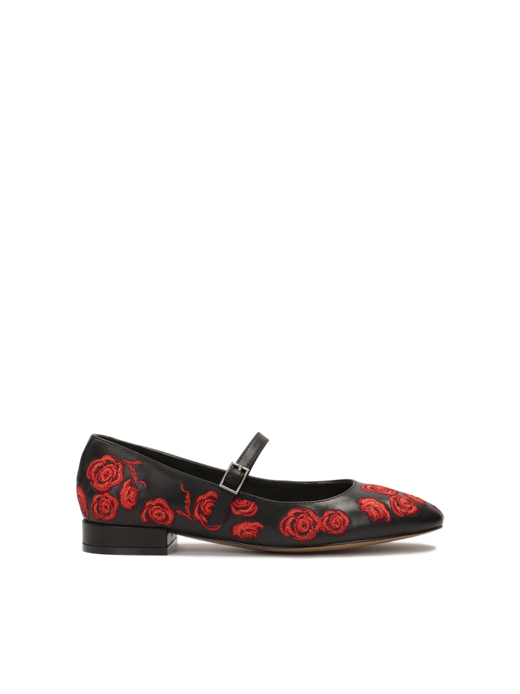 Black flat pumps with flowers