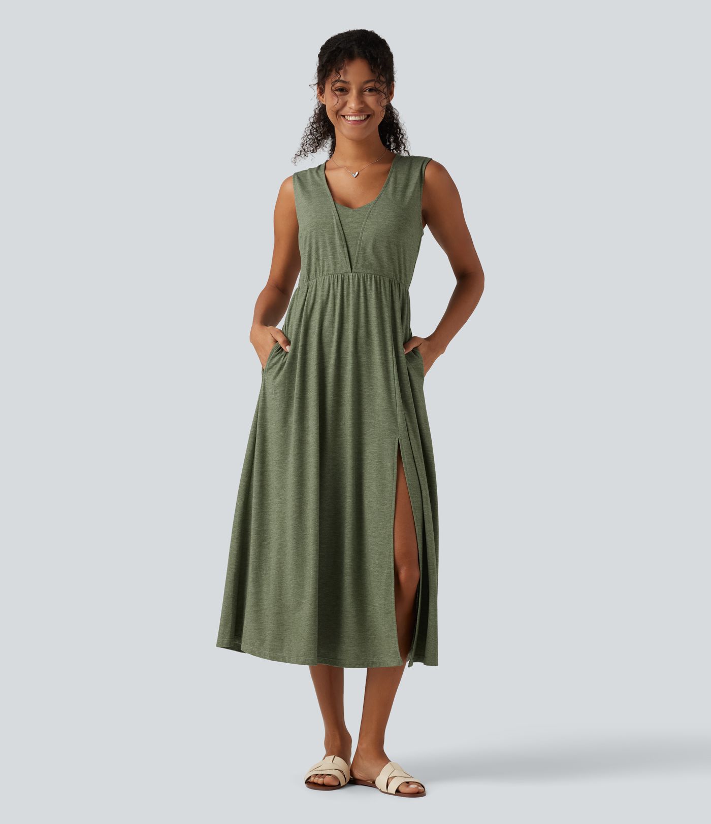 Robe midi à encolure en V, sans manches et fendue avec poches
