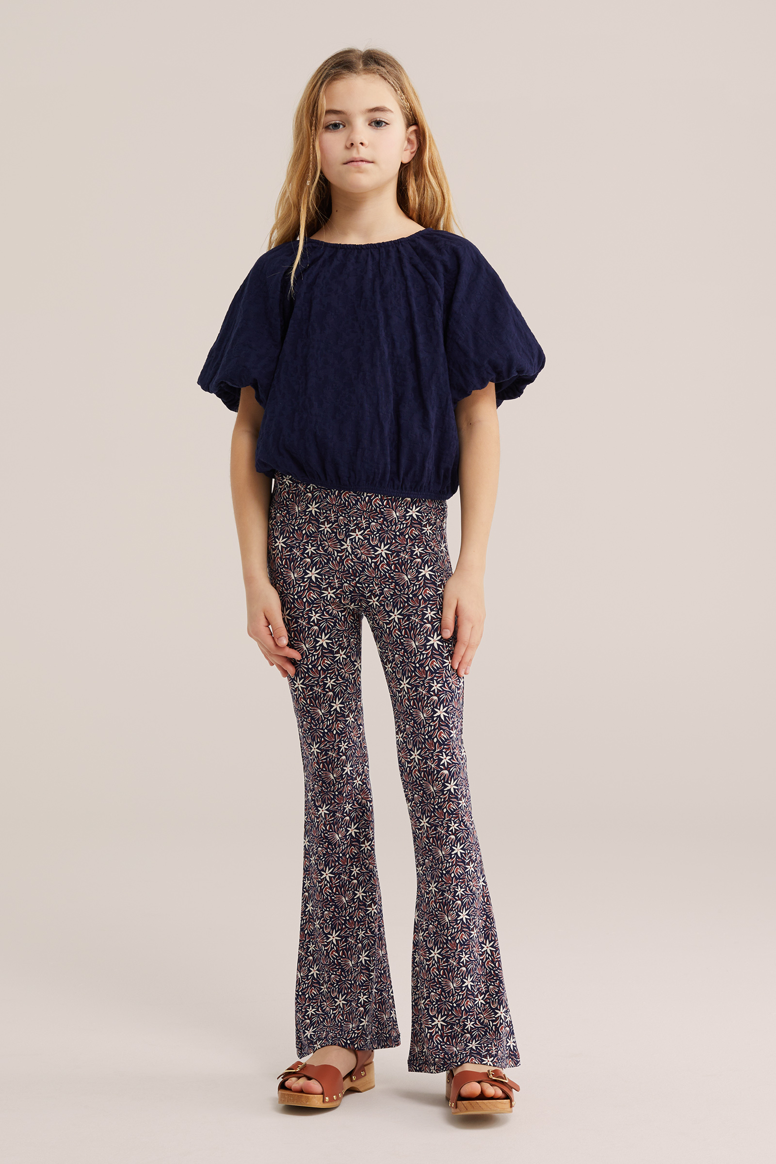 Meisjes top met structuur en ballonmouwen