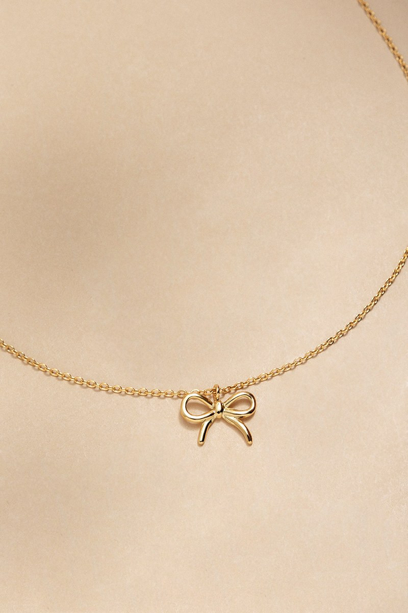 Victoria Stainless Steel Gold Bow Pendant Necklace