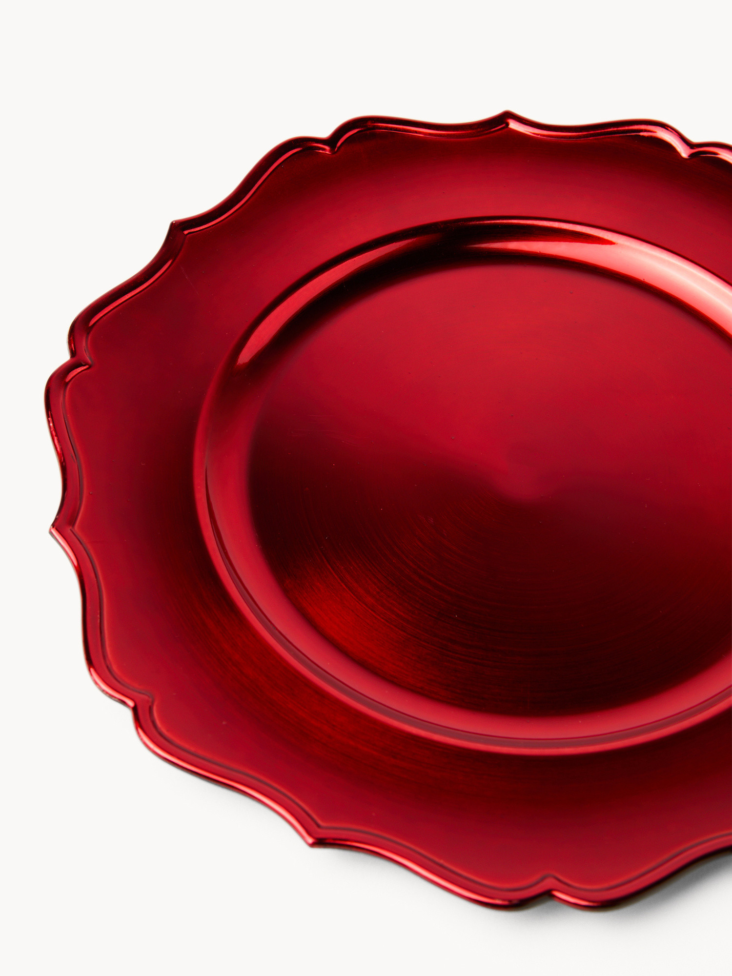 Sottopiatto con falda ondulata