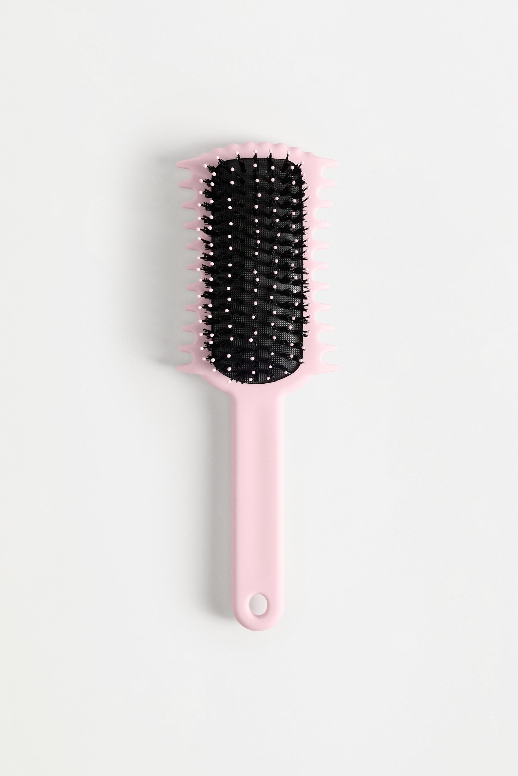 Cepillo pelo rizado