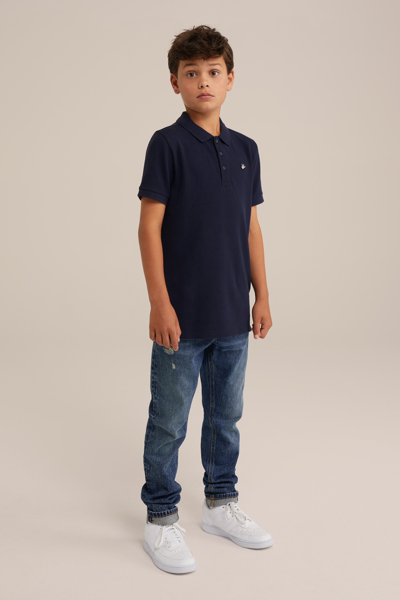 Jongens polo met structuur en embroidery