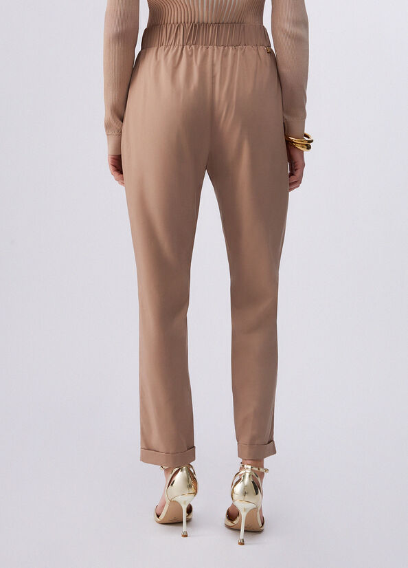 Pantaloni slim fit con risvolto