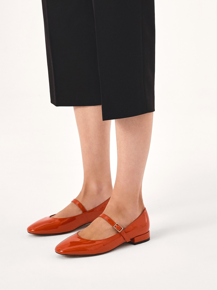 Red flat sole pumps by Mary Jane