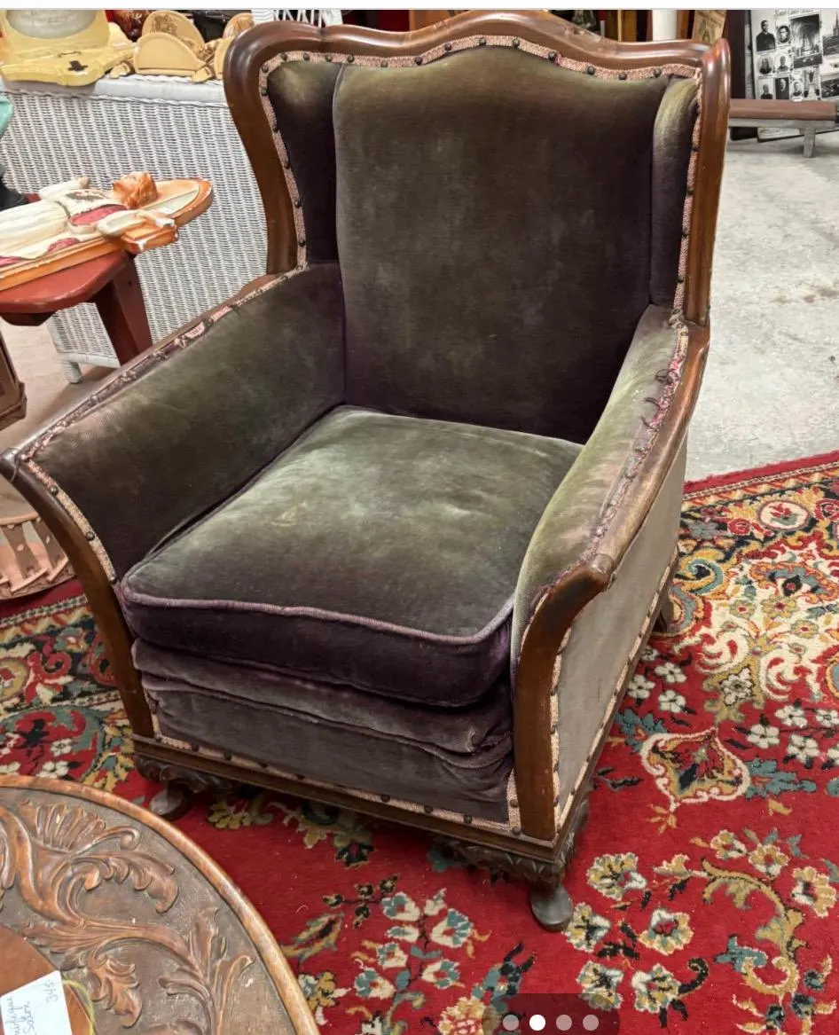 Authentic 3 seeter sofa from the 1920’s made out of solid mohagony with ORIGINAL green upholstery.