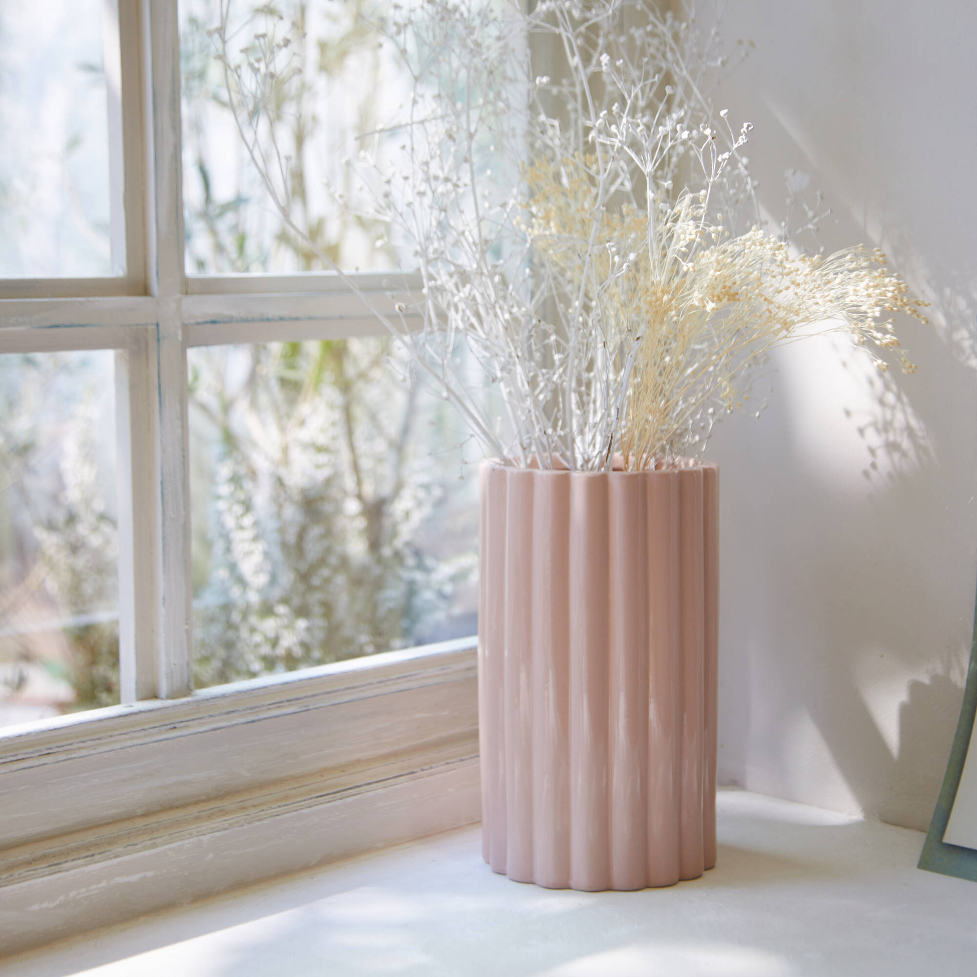 Vase strié céramique rose