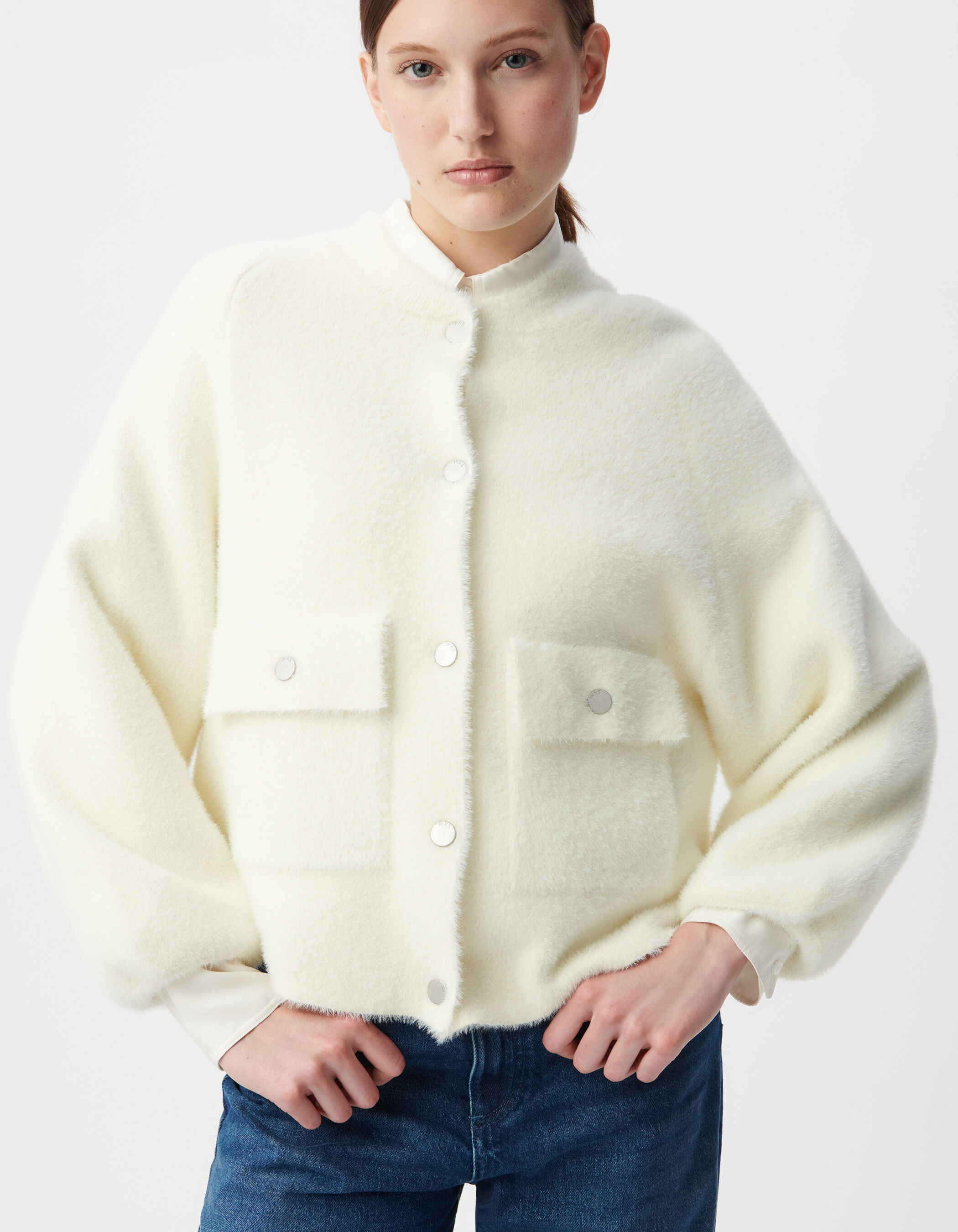Cardigan blanc tricot duveteux poches à rabat pressionné Femme