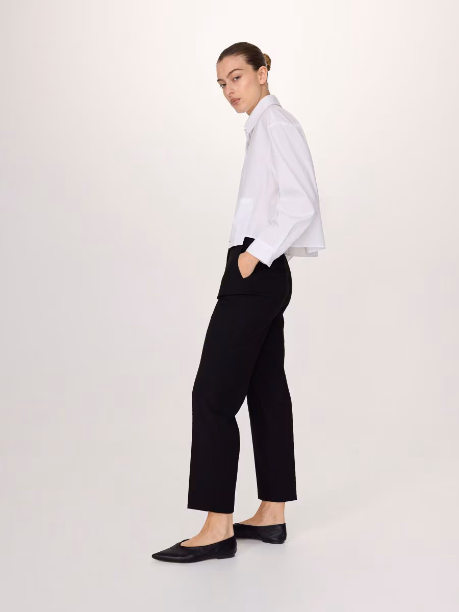 Trousers With Asymmetrical Zipping