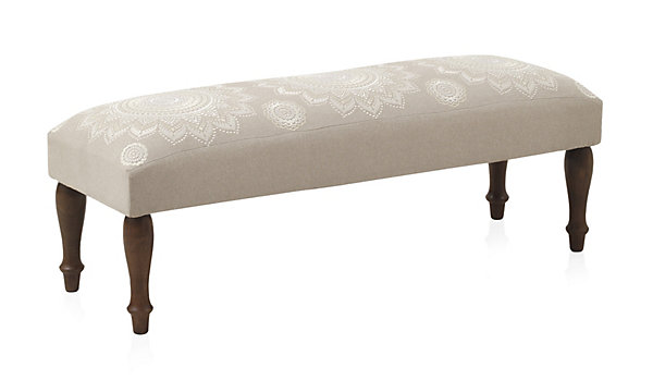Banc tapissé beige avec pieds en bois
