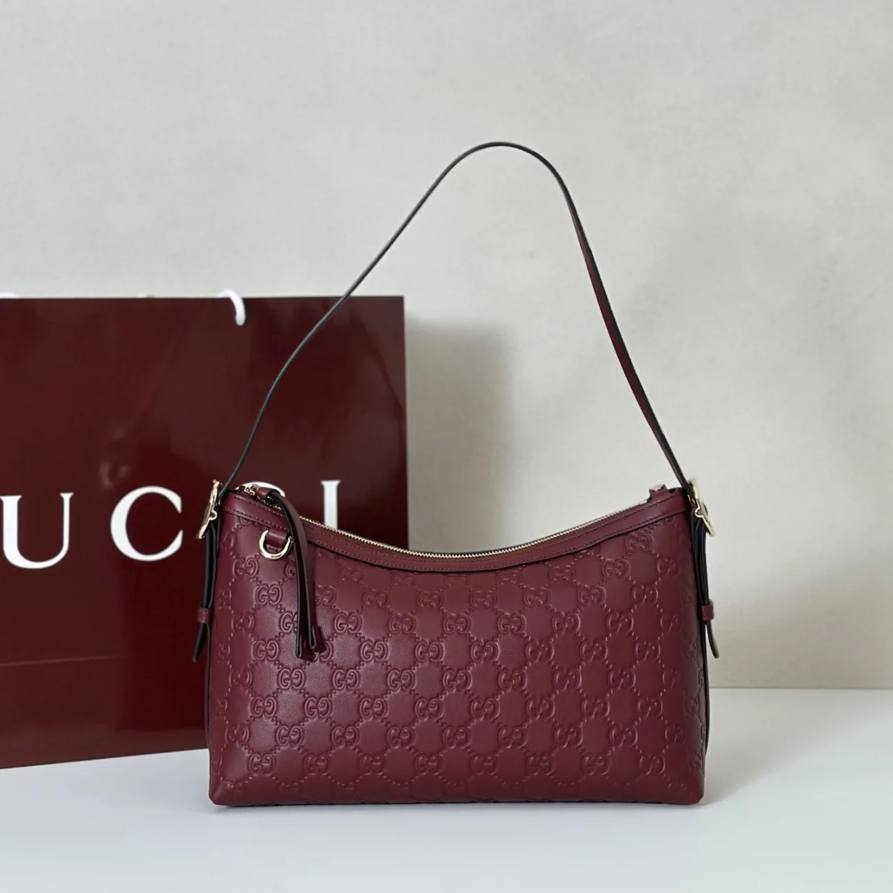 Gucci GG Emblem Medium Shoulder Bag in Leather