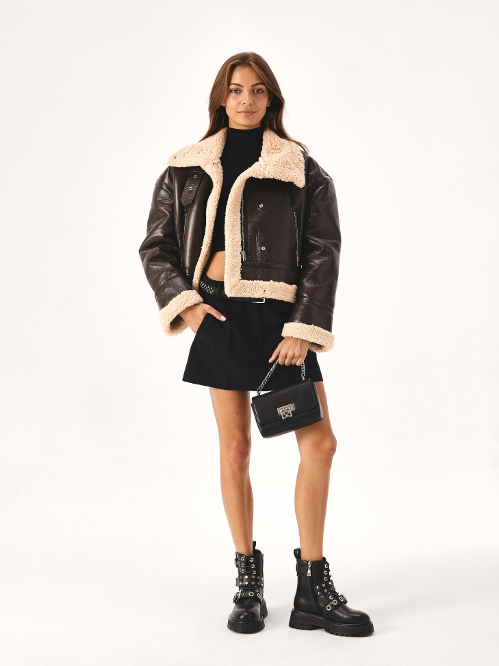 Black narrow belt decorated with silver rivets