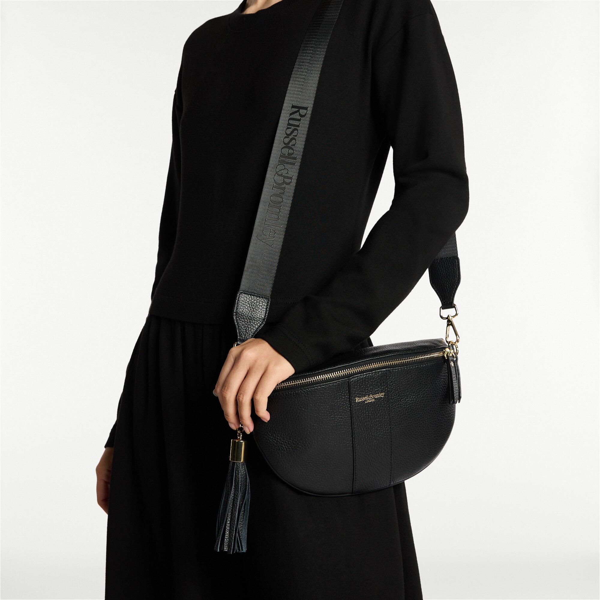 Rotate<br>Curved Crossbody Bag