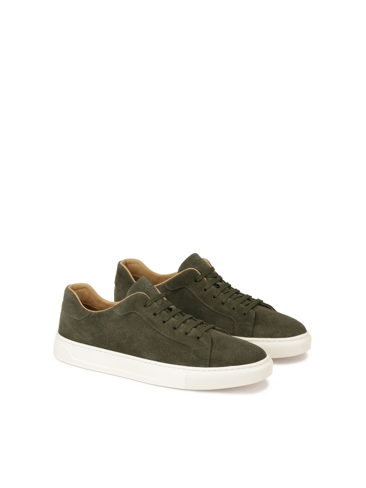 Khaki suede sneakers on a white sole