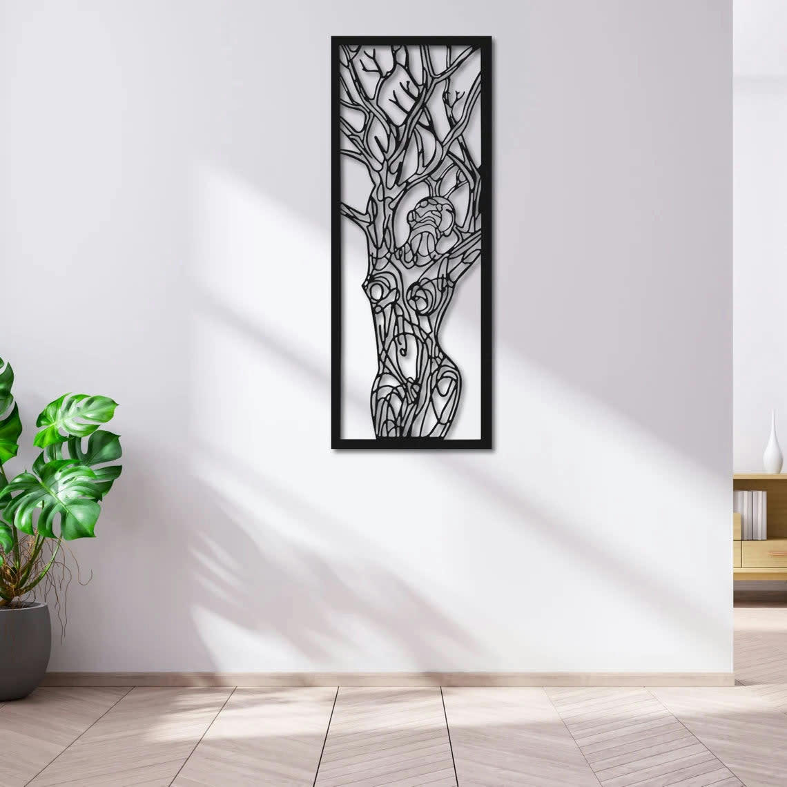 MINIMALISTE - Décoration murale femme arbre de vie en métal noir 59x23 cm