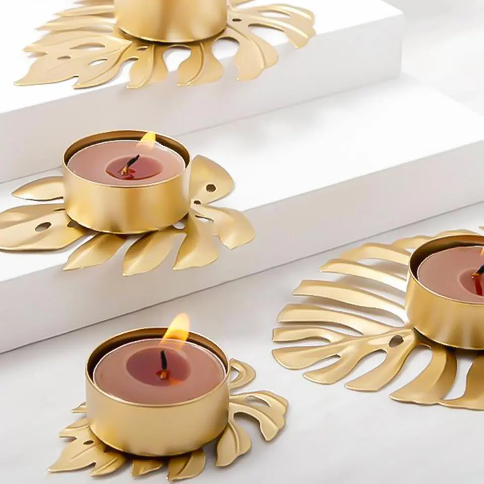 QUVIO Waxinelichthouder op een blad - 8 x 6 x 2 cm - Metaal - Goud