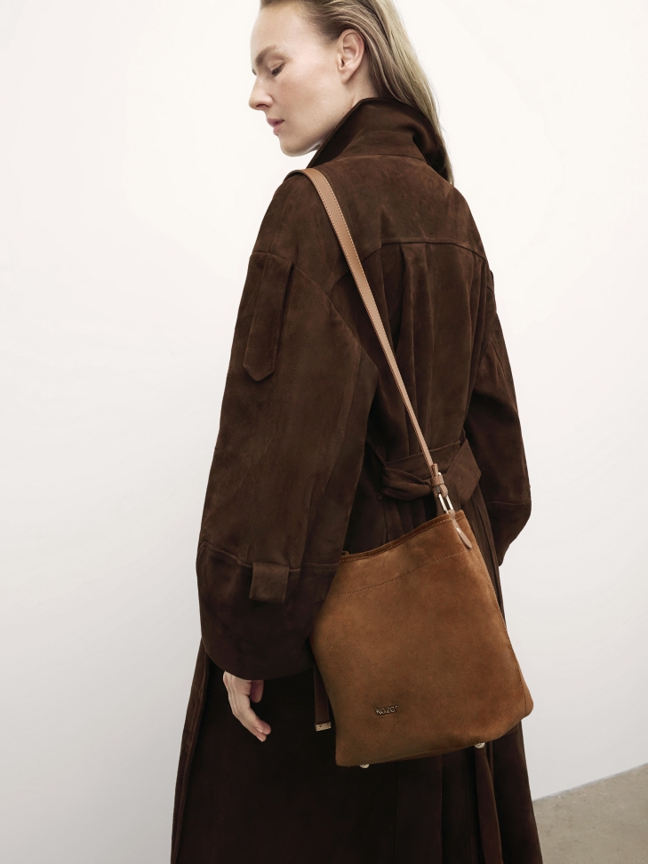 Light brown suede hobo handbag with adjustable handle