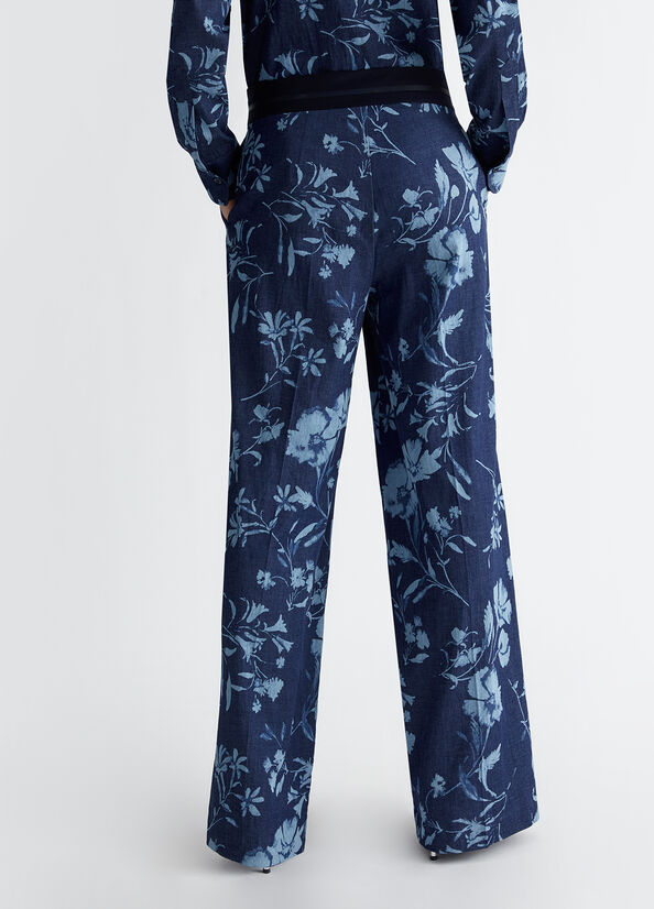 Jeans a palazzo con stampa floreale