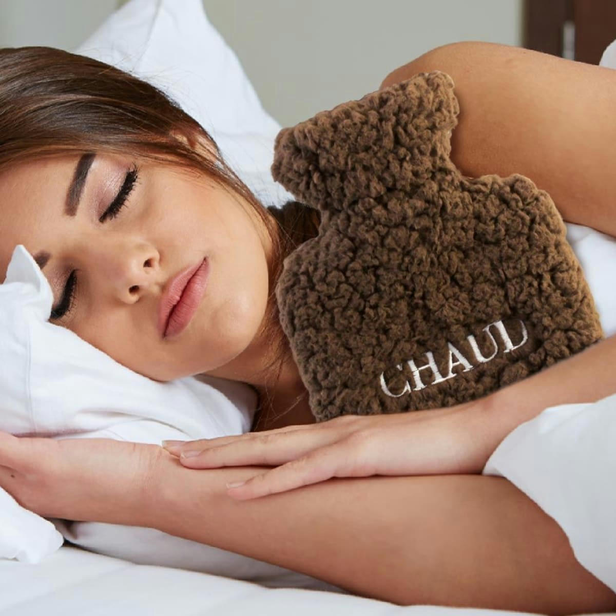 - Bouillotte marron avec enveloppe en fourrure