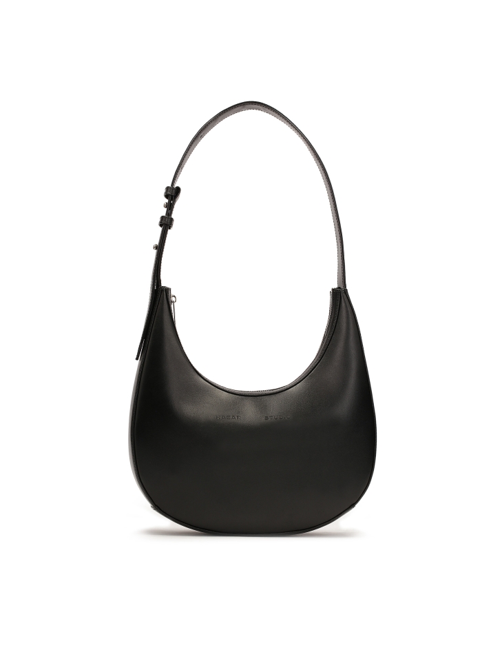 Black shoulder bag with an adjustable handle