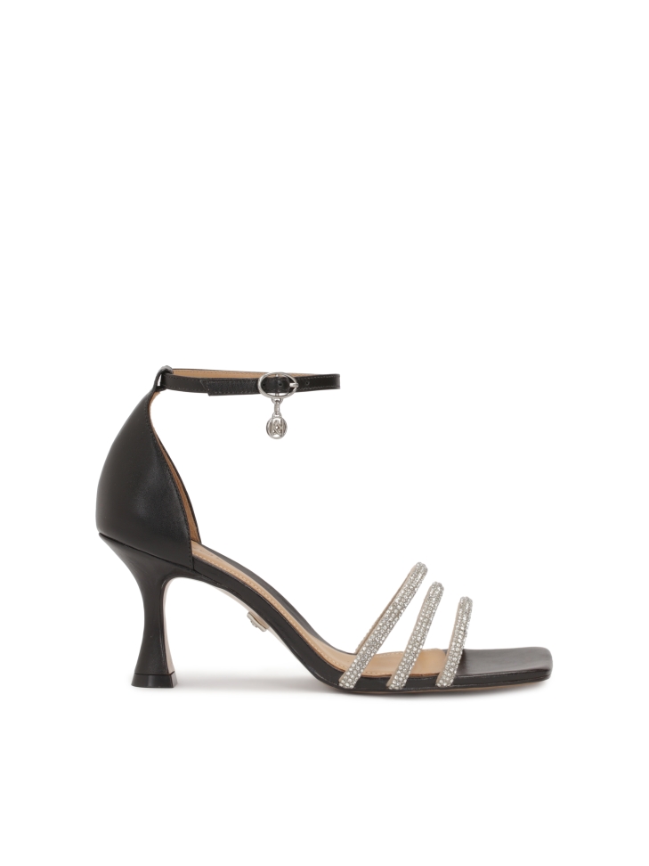 Leather sandals on a heel with shiny straps