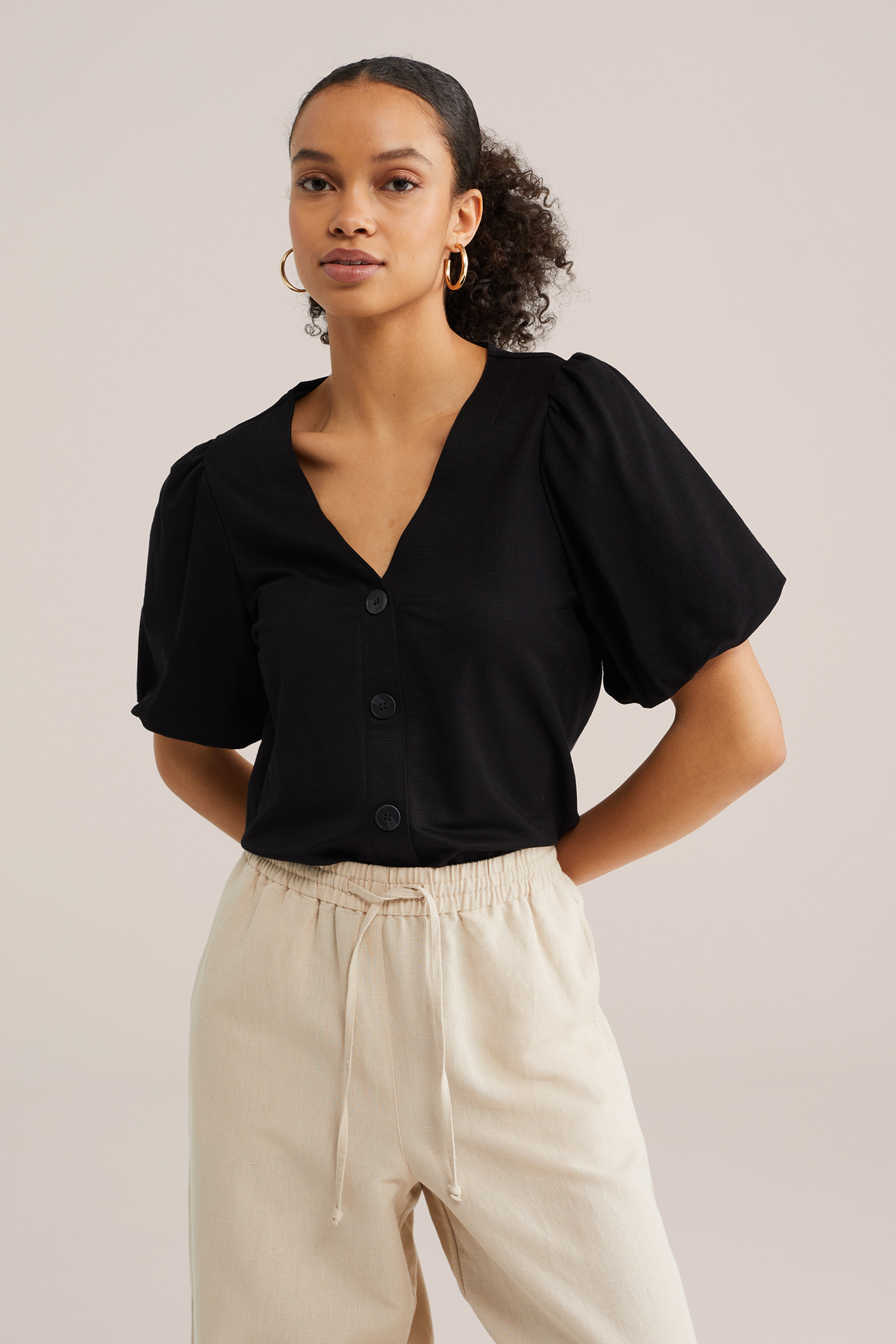 Dames jersey top met ballonmouwen