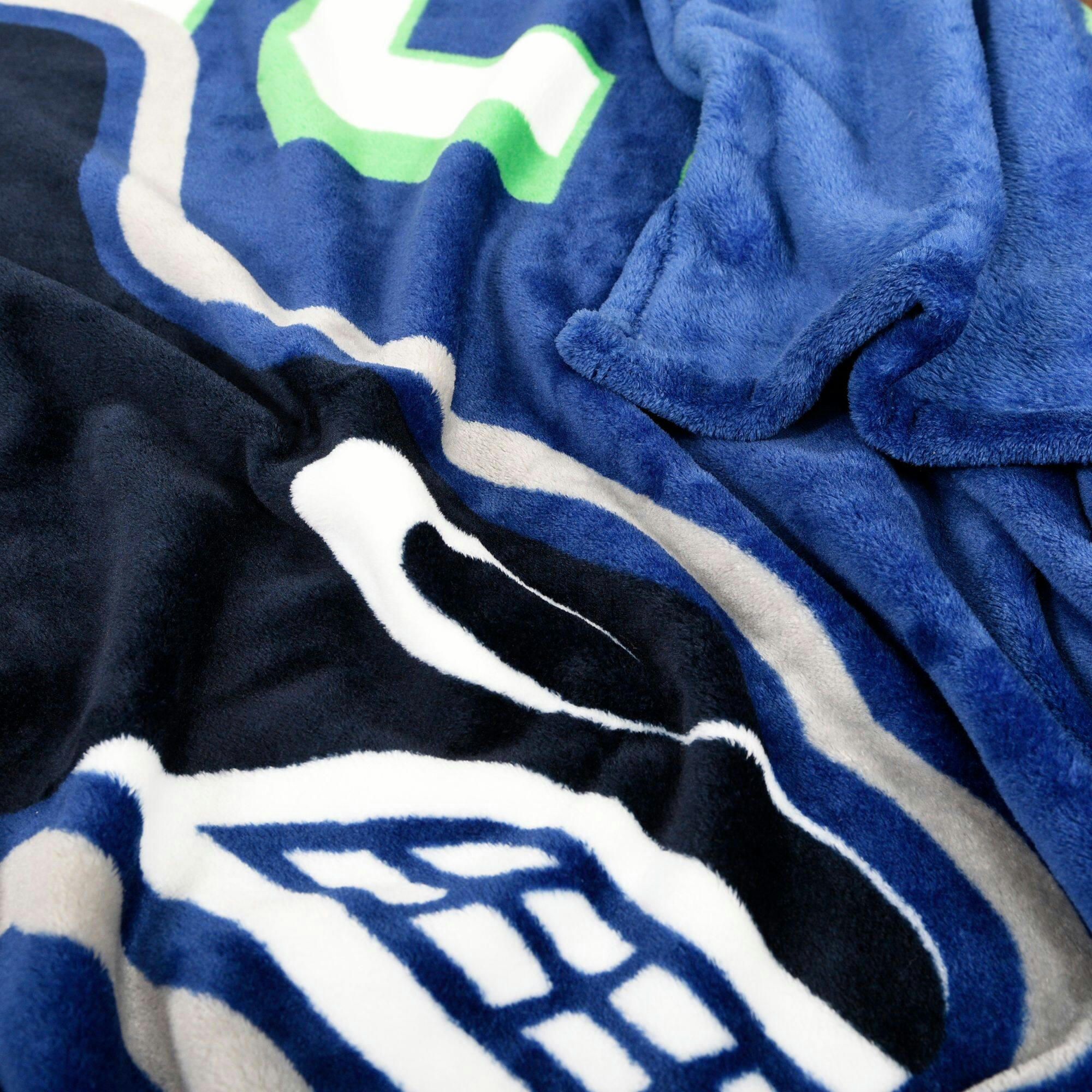NHL Vancouver Canucks Officially Licensed Hockey Jumbo Plush Blanket, 60-in x 90-in