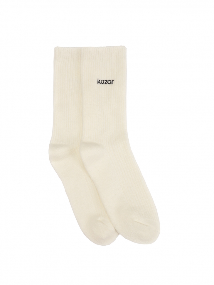 Ribbed socks in broken white color