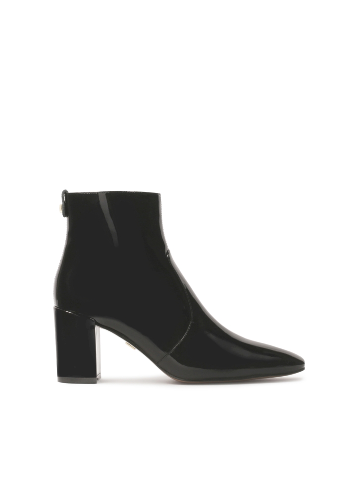 Patent leather boots with extended truncated toes