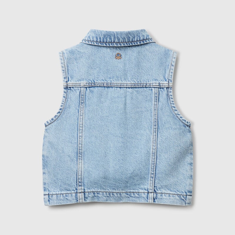 Denim vest with flower patch