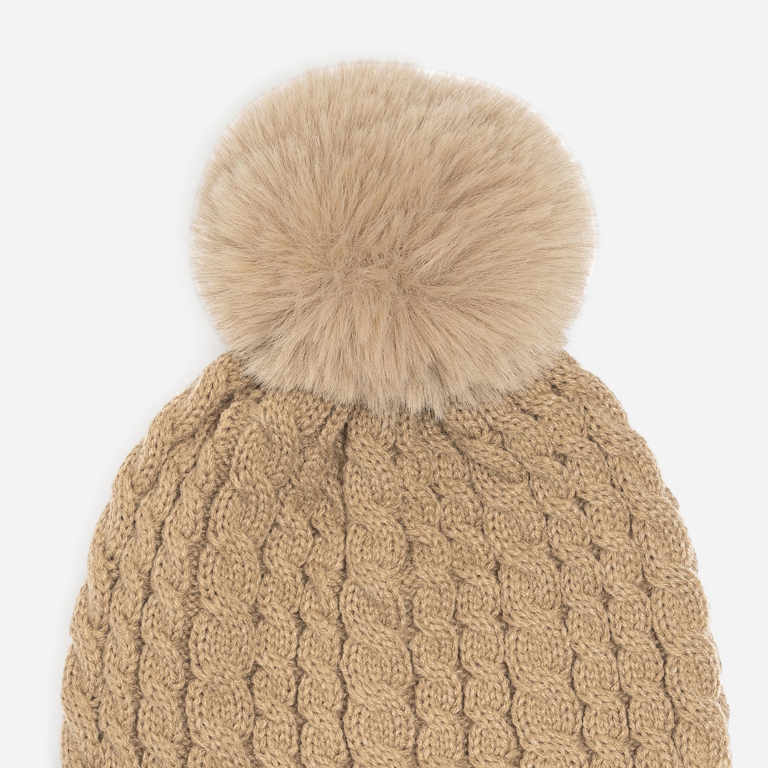 Bonnet camel en tricot torsadé à pompon