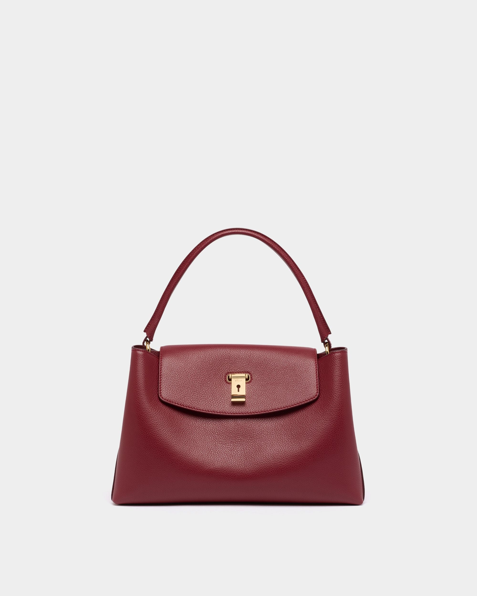 Henkeltasche Lock Me aus genarbtem Leder in Ruby Red