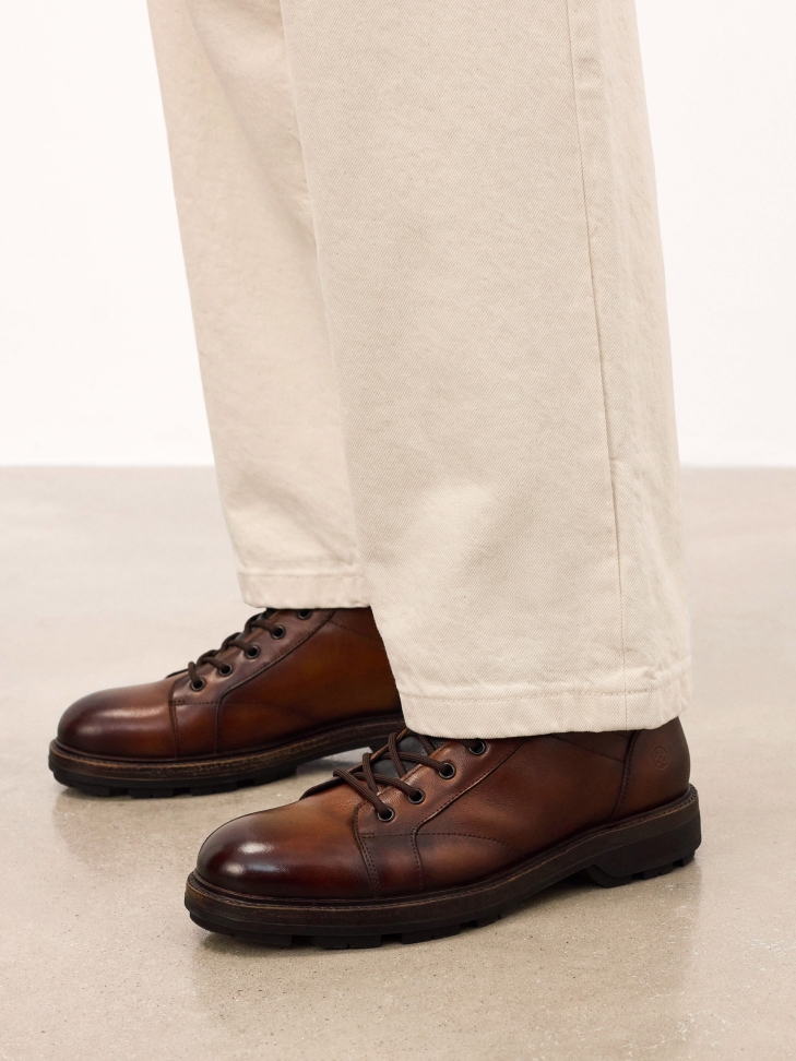 Brown leather boots with insulated collar