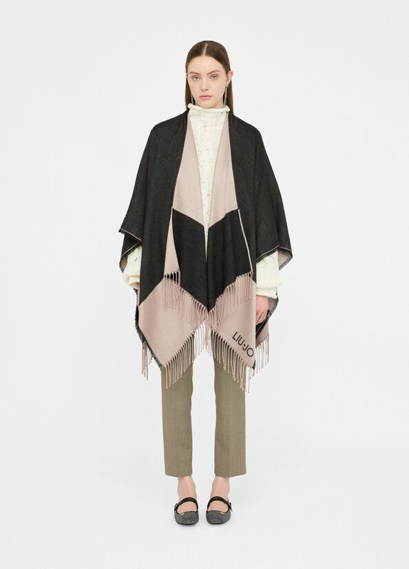 Poncho con logo e frange