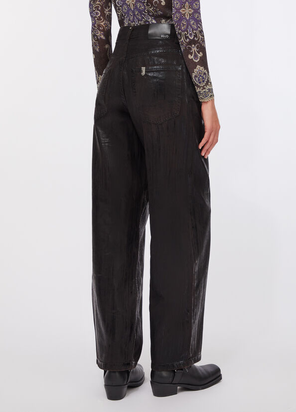 Jeans flare con spalmature