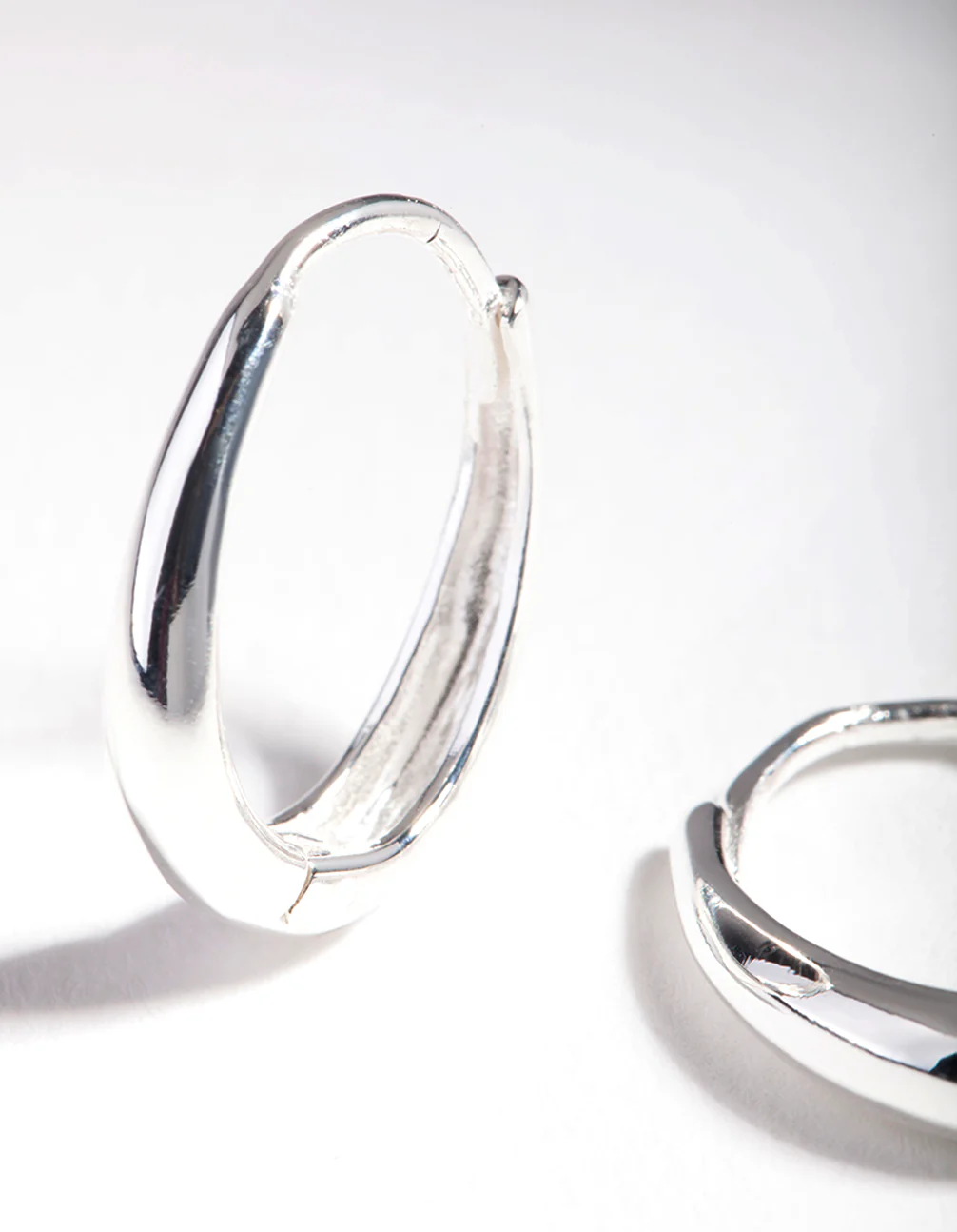 Sterling Silver Oval Drop Huggie Earrings