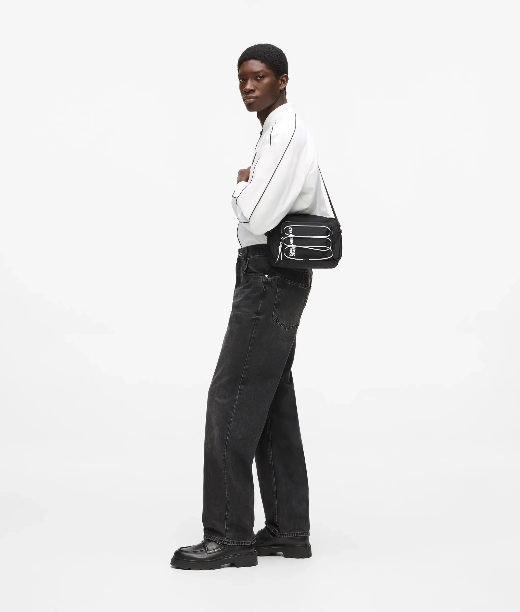 Sac caméra de style utilitaire avec cordon de serrage