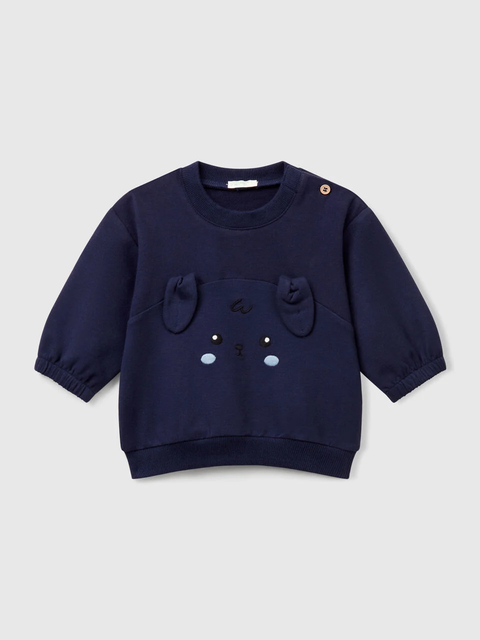Sweatshirt with embroidery and patches